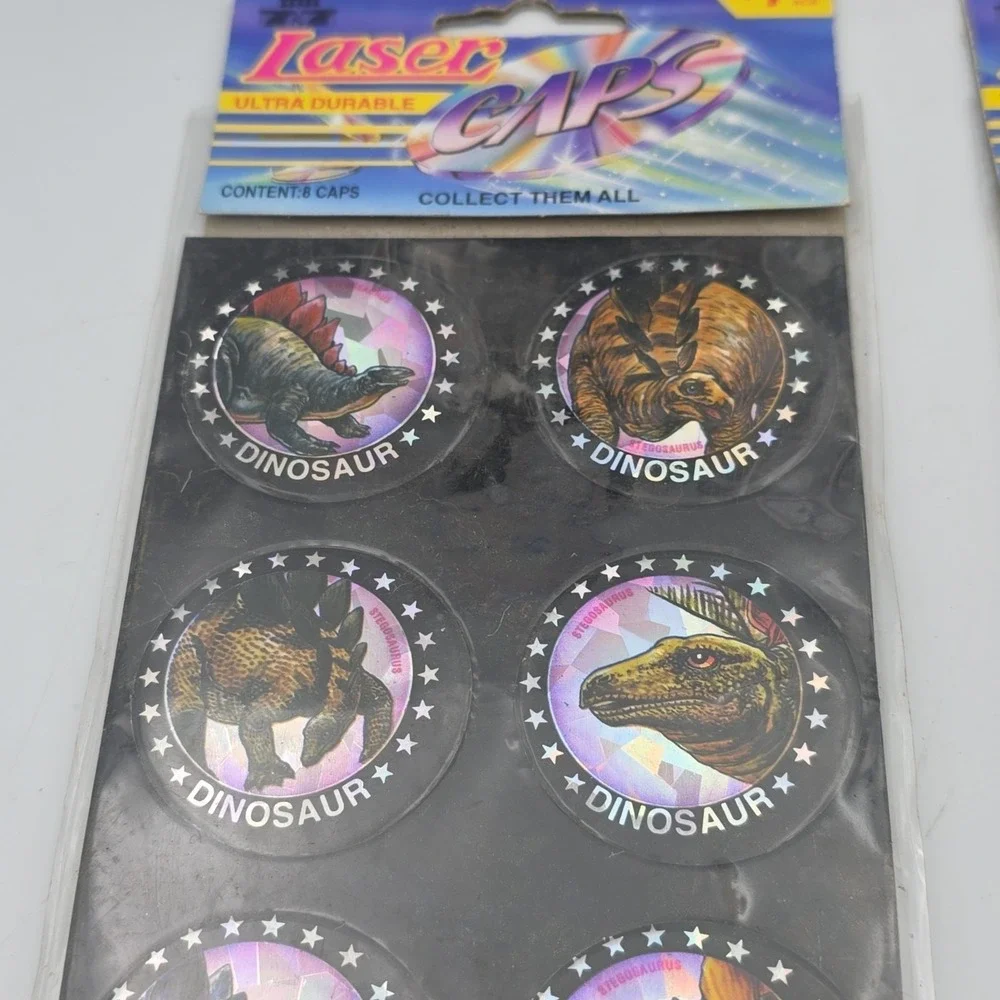 Jurassic Pogs On‎ Sheet Lot Of 32 Dinosaurs Laser Caps USA VTG NEW